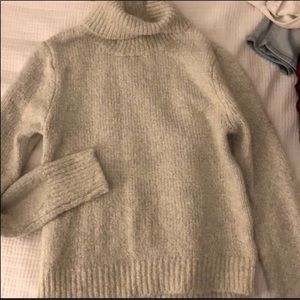 brandy. cream turtle neck